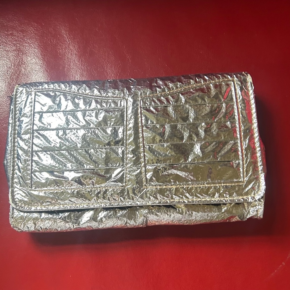 Vintage silver clutch; very retro chic; very good condition, very unique